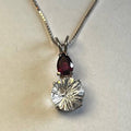 Clear Quartz Supernova with Rhodolite Garnet